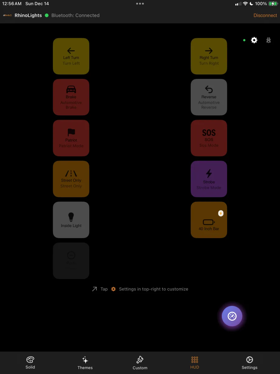 The RhinoLink iOS app HUD screen, with tap tiles for turn signals, brake, reverse and each lighting zone